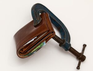 Vice squeezing a wallet