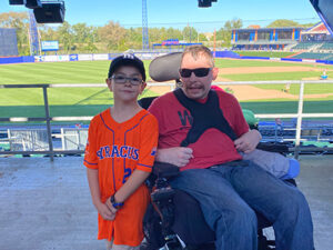 Mike Theobald and his nephew at the ballpark