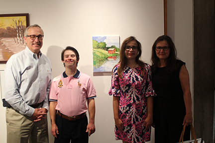 Artist Joe Rufo and his family at the UNIQUE Exhibit Open. Joe is the 2022 Cover Artist.
