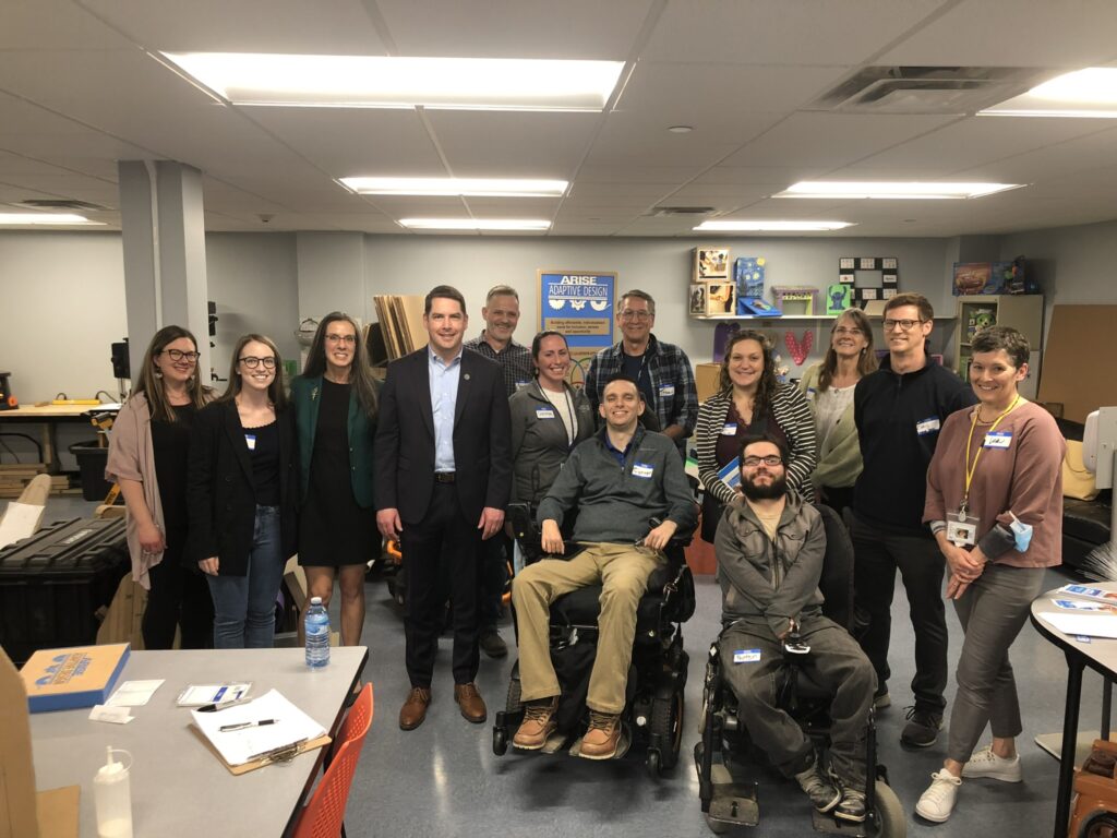From left to right: Heather Hafler, Maddy Locastro, Tania Anderson-CEO ARISE, Syracuse Mayor Ben Walsh, James Fathers, Christine Pelis, Connor McGough-Adaptive Design Coordinator, Tracy Fleming-Fabrictor, Julie LaFave, Peyton Sefick, Dr.Nienke Dosa, Chris Abbott, and Lisa Neville